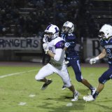 Jack Foote races down field after catch.